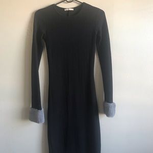 Black dress with fur accented sleeves